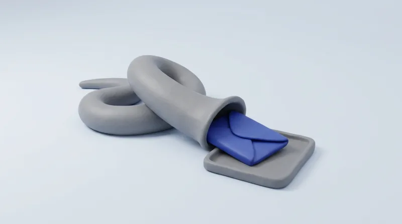 A loosely coiled grey tube with a blue envelope emerging from its open end onto a small grey tray